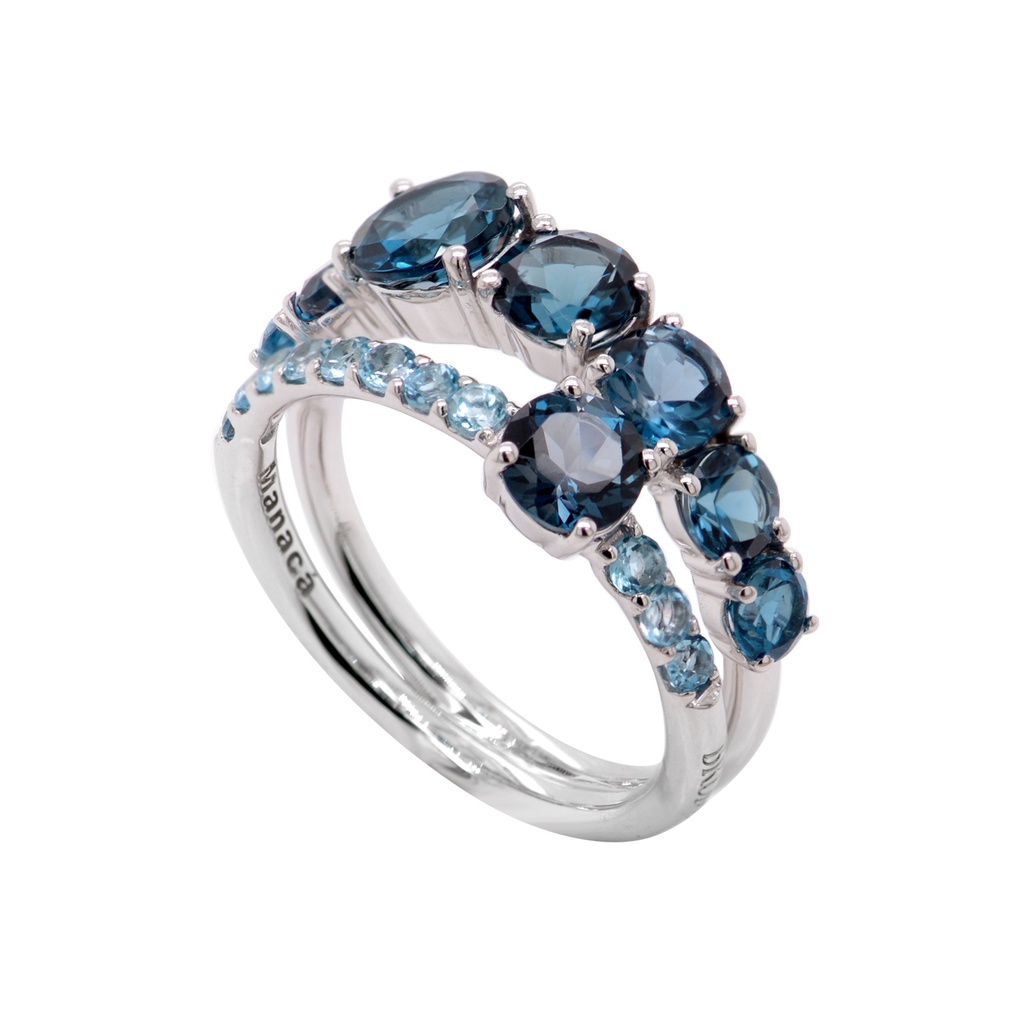 ANILLO BRUMANI “MANACA“ 8-TOPACIOS AZUL LONDON-3.63ct 11-TOPACIOS AZUL SKY BLUE-0.60ct 5.5gr. ORO BLANCO 18K 