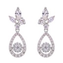 ARETES  60-DIAMANTES Talla/Brillante 0.66ct, 2-DIAMANTES Talla/Marquis 0.25ct, 3.62gr. ORO BLANCO 18K