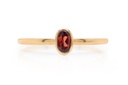 ANILLO LAS FLORES-GRANATE/OVAL 1.20 18KY