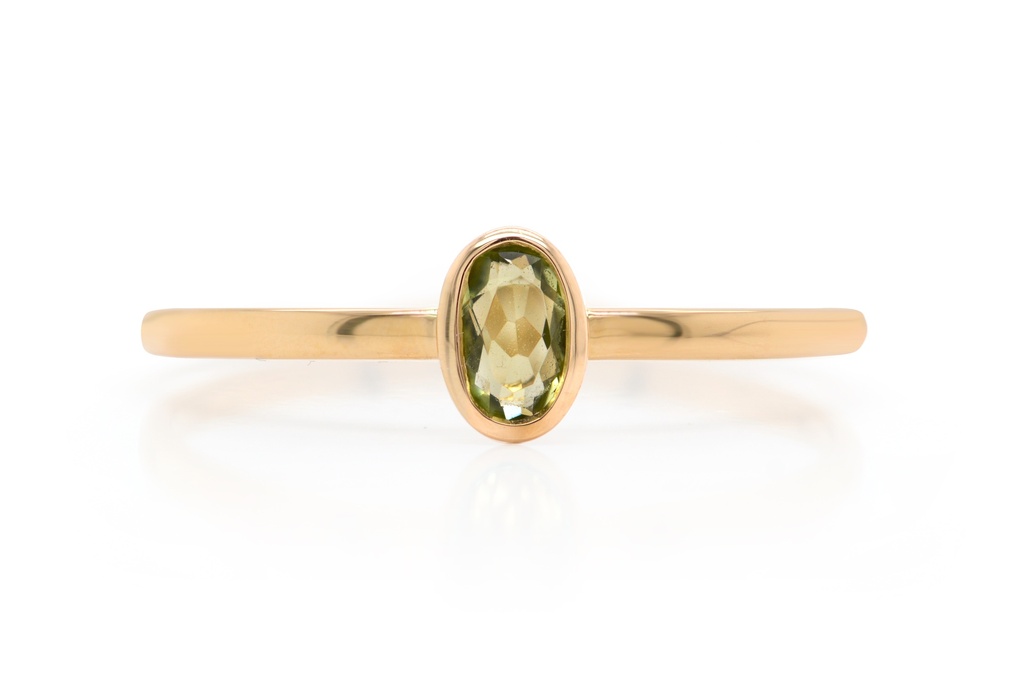 ANILLO LAS FLORES-PERIDOTO/OVAL 1.30 18KY