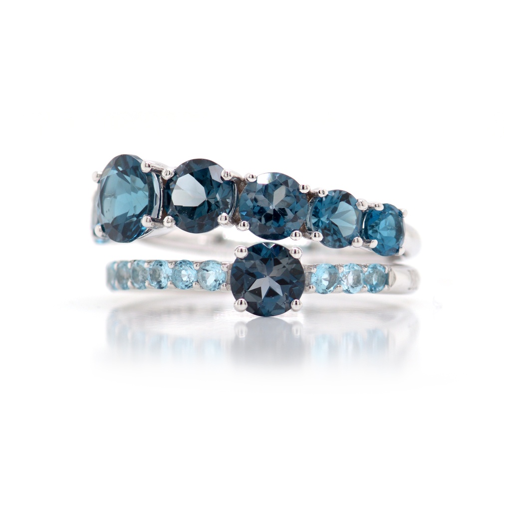 ANILLO BRUMANI “MANACA“ 8-TOPACIOS AZUL LONDON-3.63ct 11-TOPACIOS AZUL SKY BLUE-0.60ct 5.5gr. ORO BLANCO 18K 